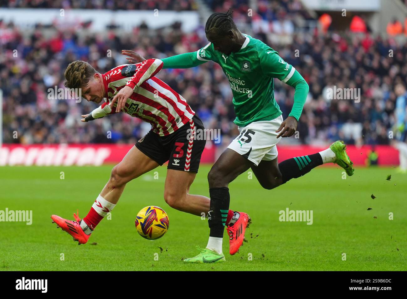 Plymouth Argyle's Mustapha Bundu (right) and Sunderland's Dennis Cirkin