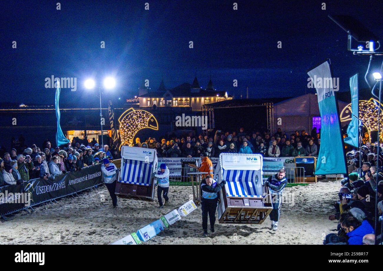25 January 2025, Mecklenburg-Western Pomerania, Ahlbeck: Two teams race ...