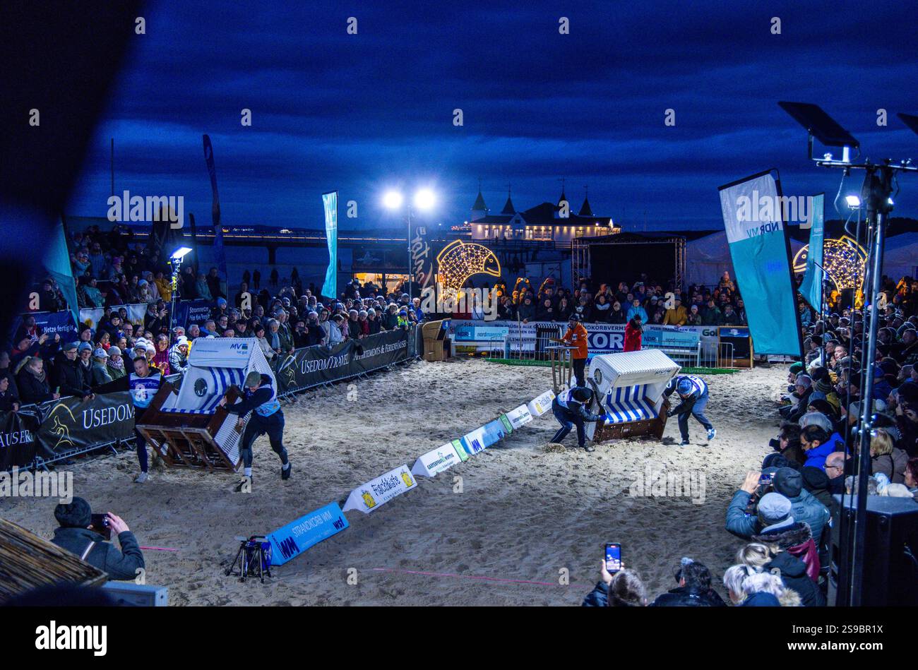 25 January 2025, Mecklenburg-Western Pomerania, Ahlbeck: Two teams race ...