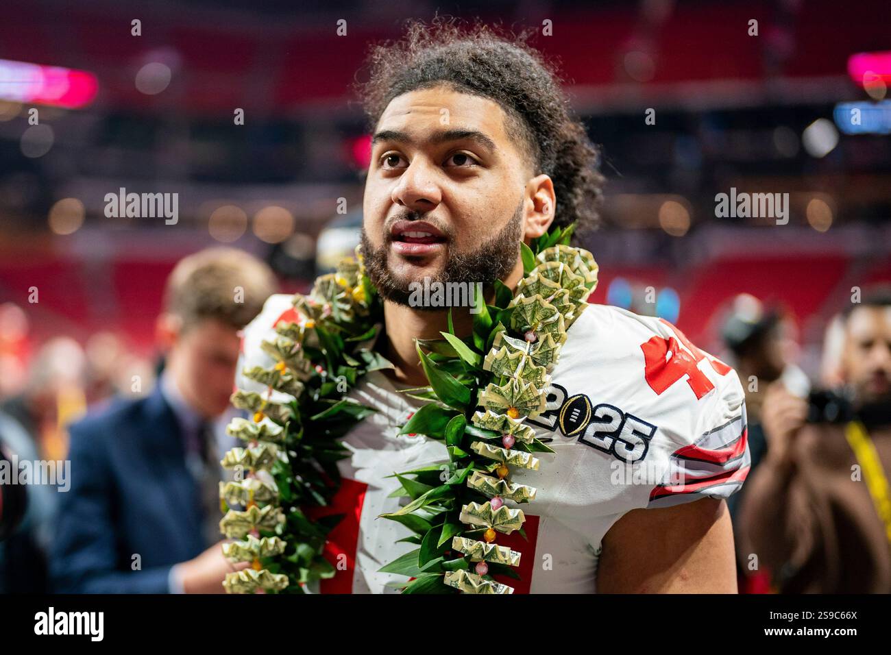 Ohio State defensive end JT Tuimoloau (44) celebrates after defeating