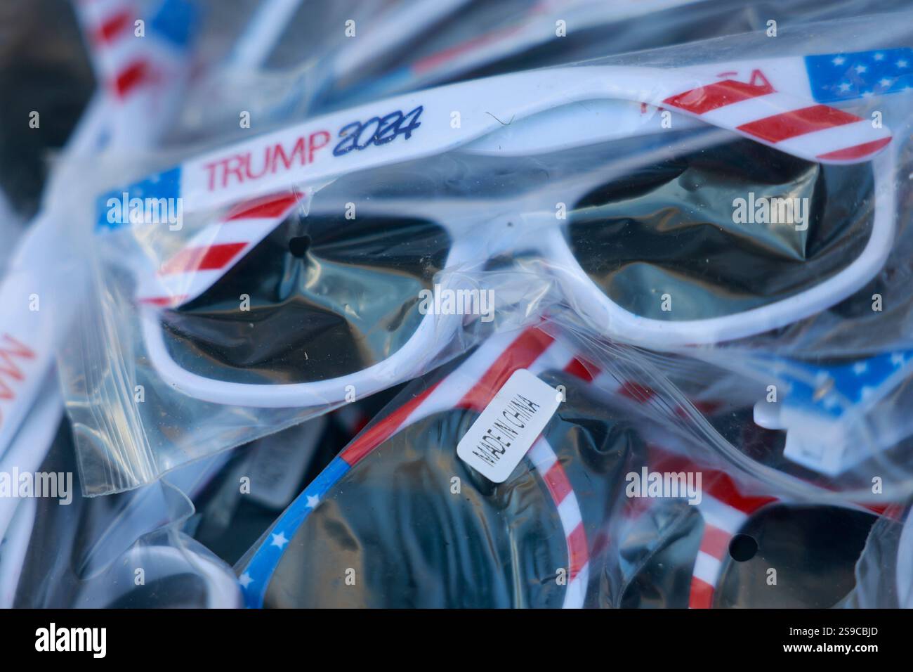 Vendors sell Donald Trump merchandise including sunglasses made in ...