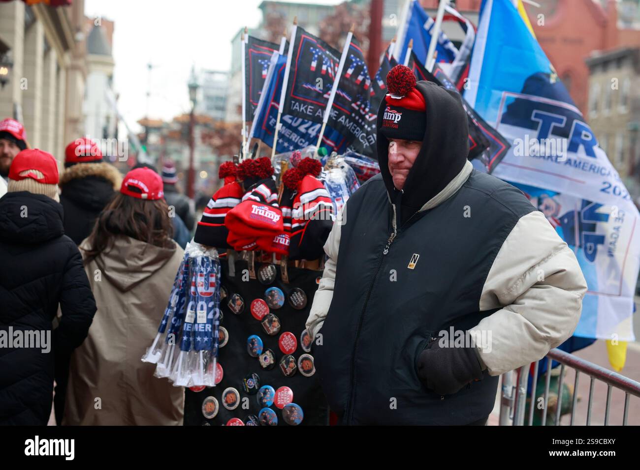 Vendors sell Donald Trump merchandise on Inauguration Day. Trump was ...