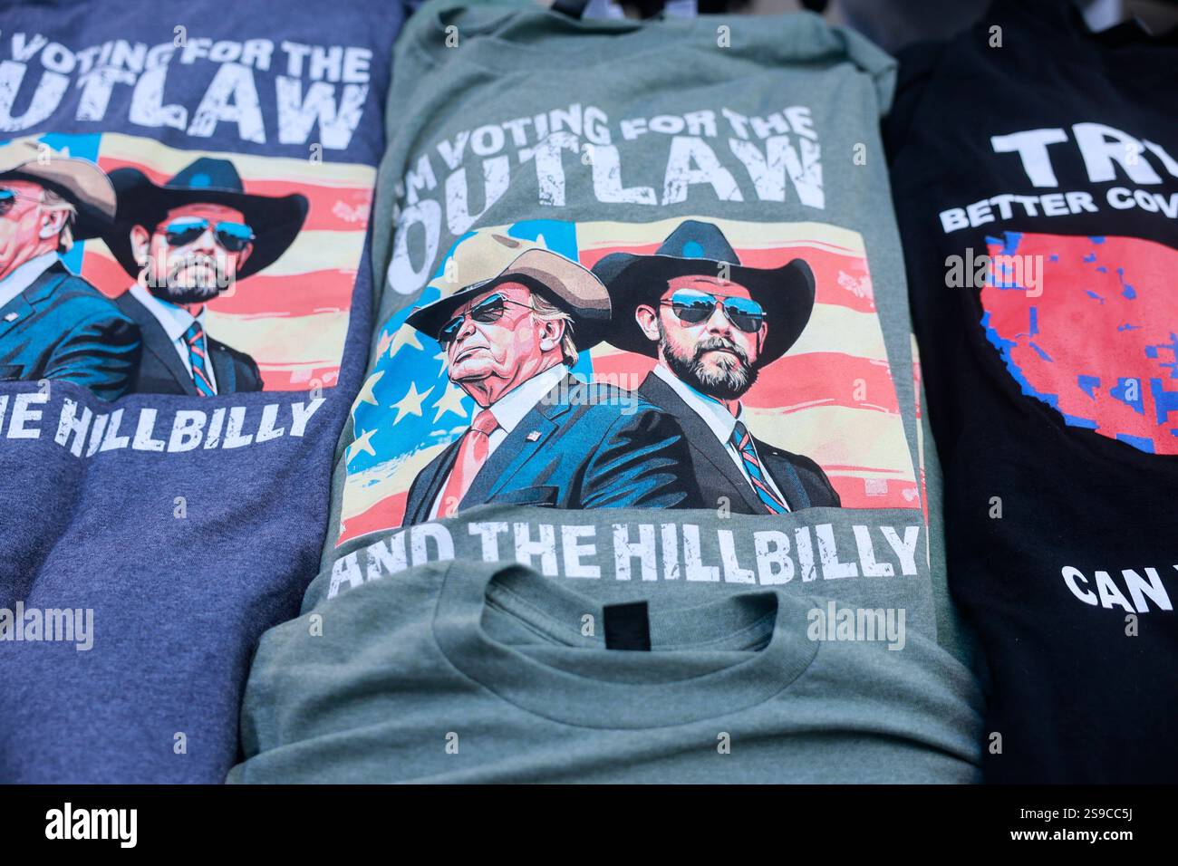 Vendors sell Donald Trump merchandise on Inauguration Day. Trump was ...
