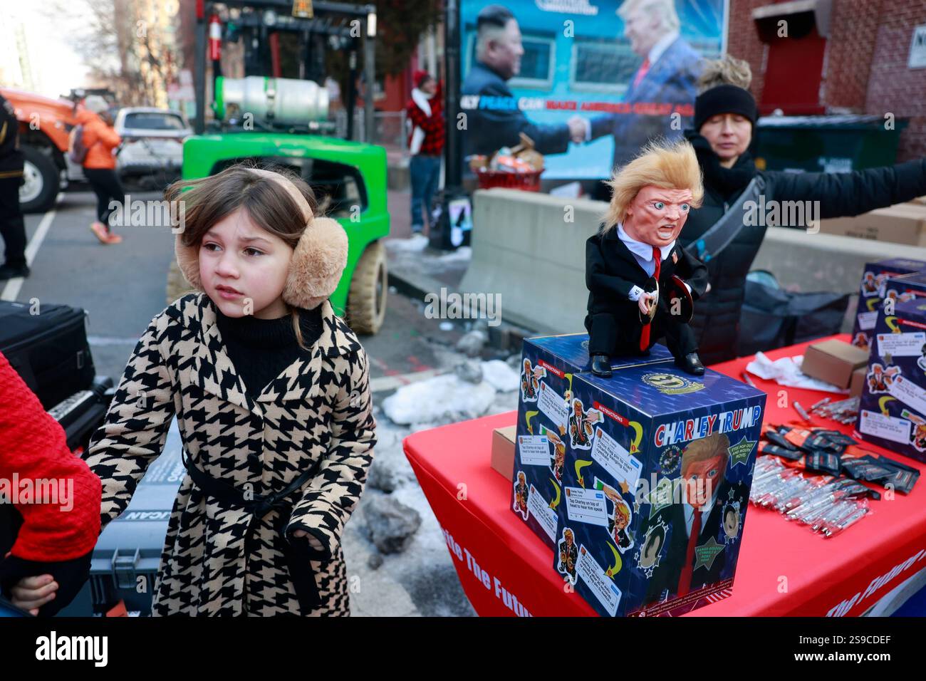 Vendors sell Charley Trump doll merchandise on Inauguration Day. Trump ...
