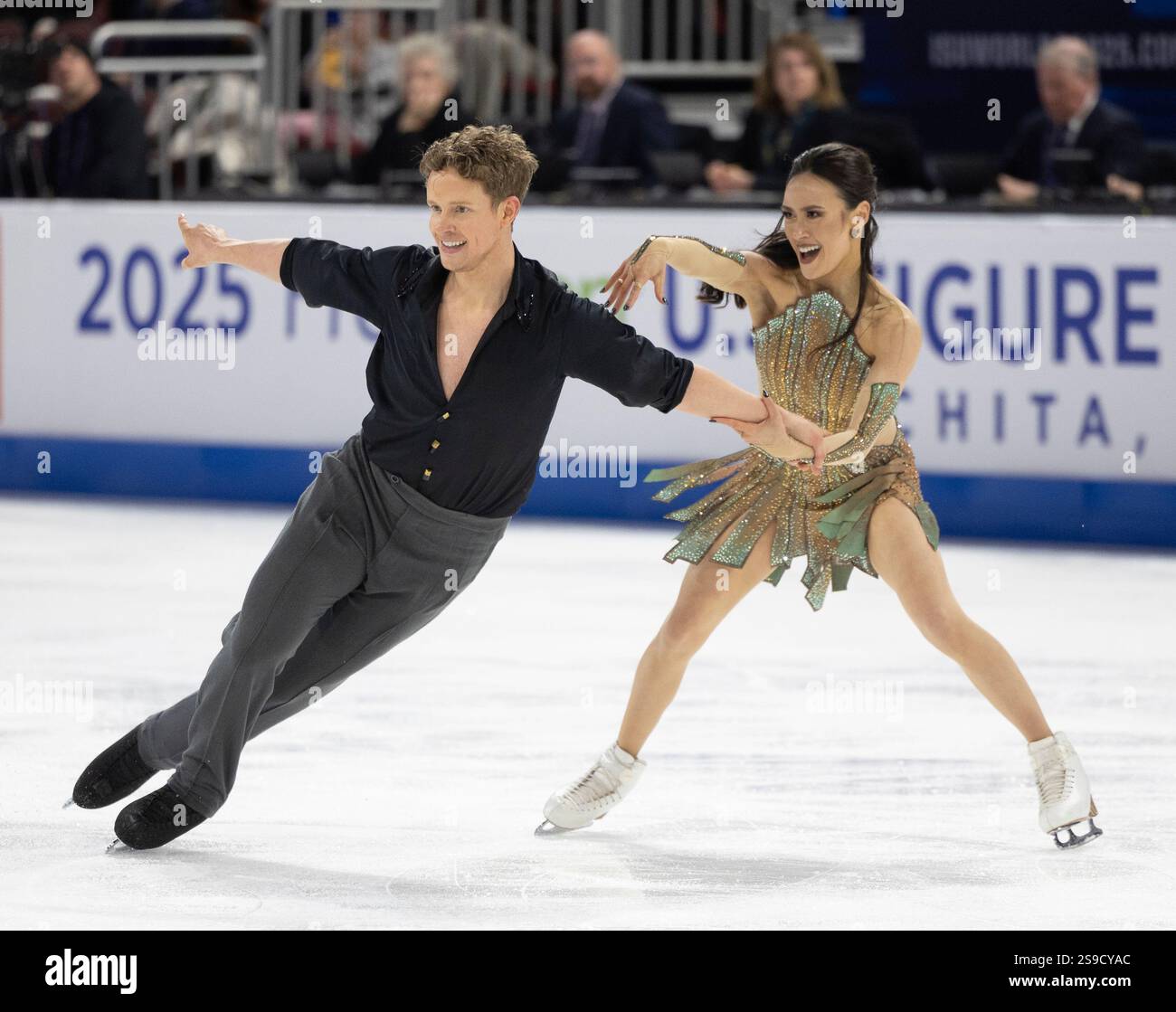 Madison Chock, right, and Evan Bates, left, perform during the ice