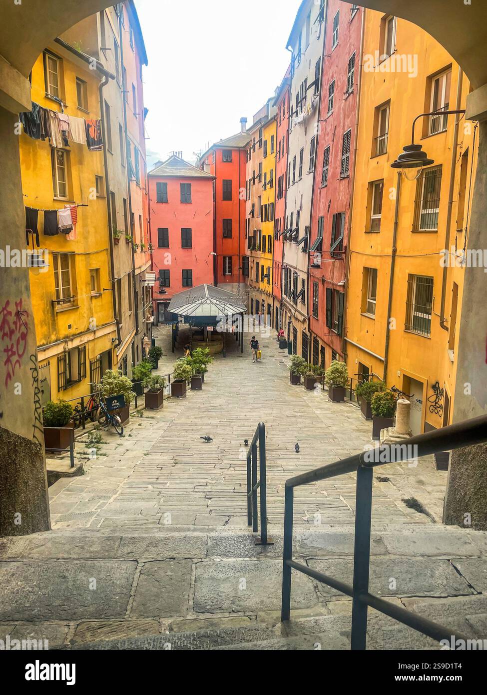 Colourful buildings in Genoa's Santa Brigida square, (Genova, truogoli di Santa Brigida) - Smartphone Captured Stock Image