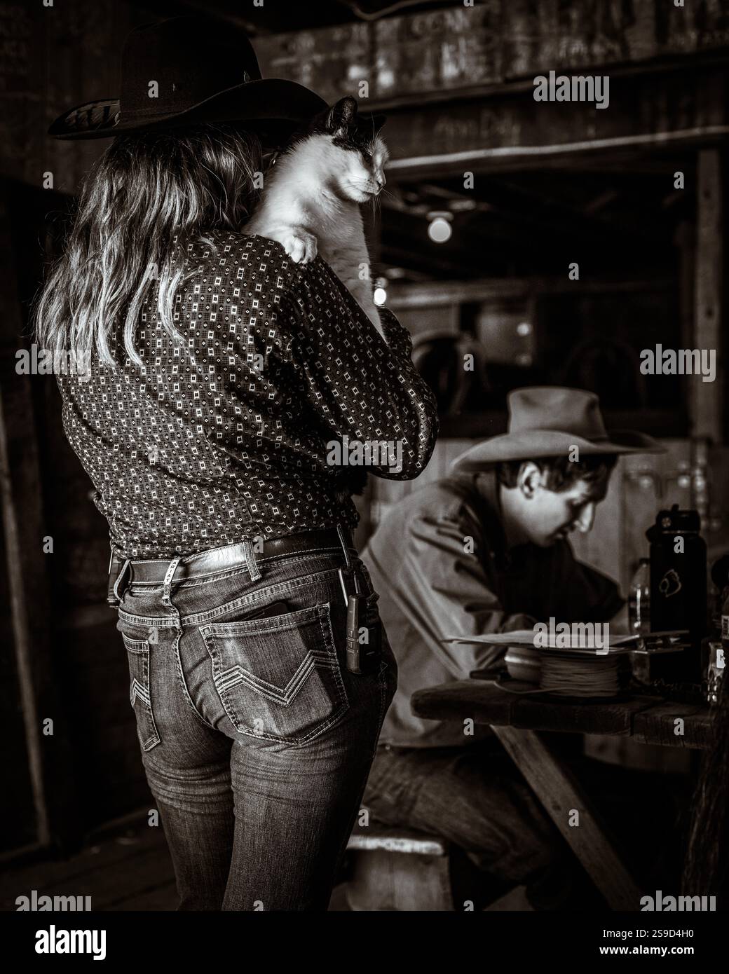 Cowgirl getting ready for the day at a Dude Ranch in Montana Stock ...