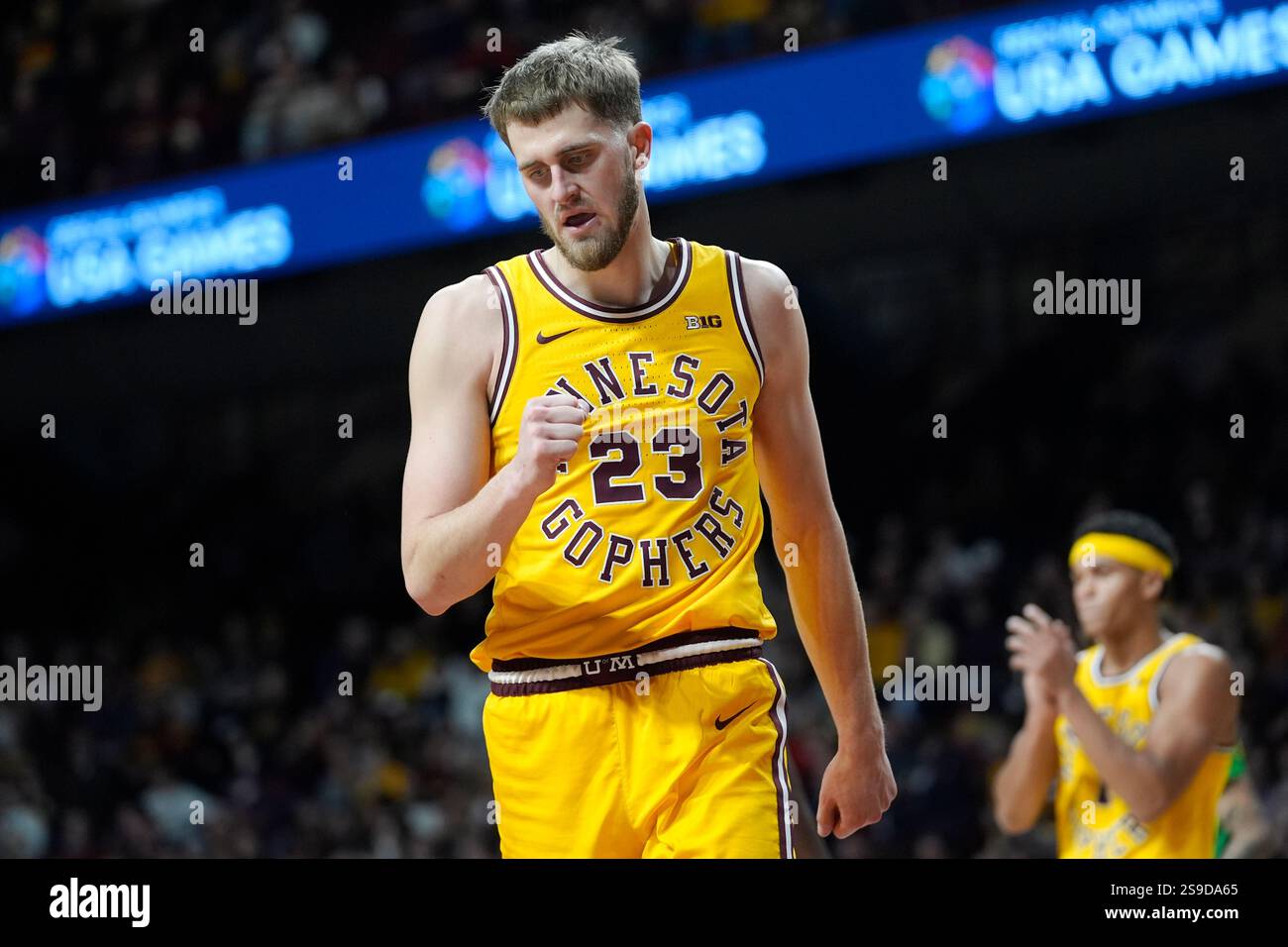 Minnesota forward Parker Fox (23) pumps his fist during the second half