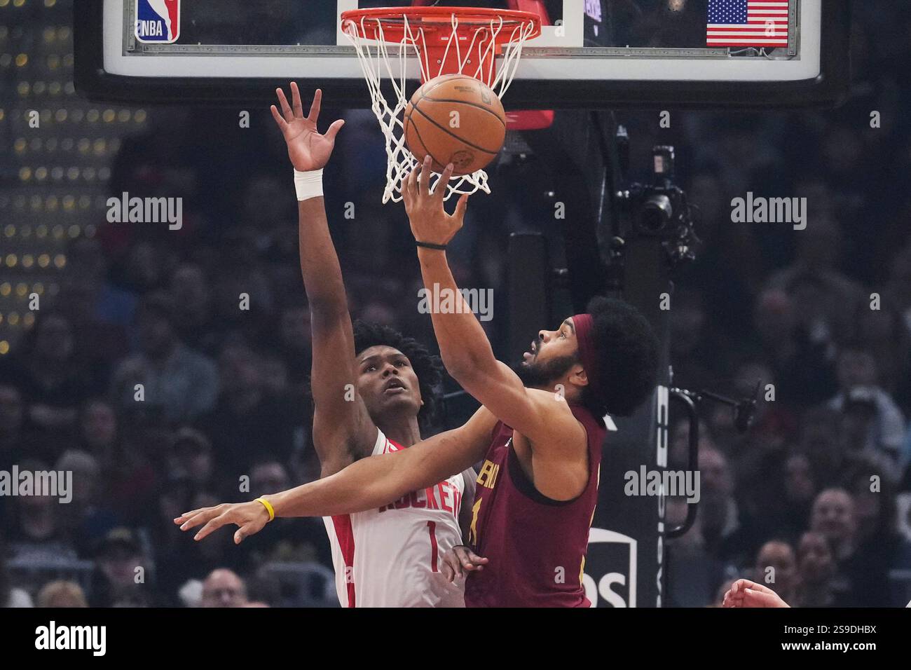 Cleveland Cavaliers center Jarrett Allen, right, shoots as Houston ...