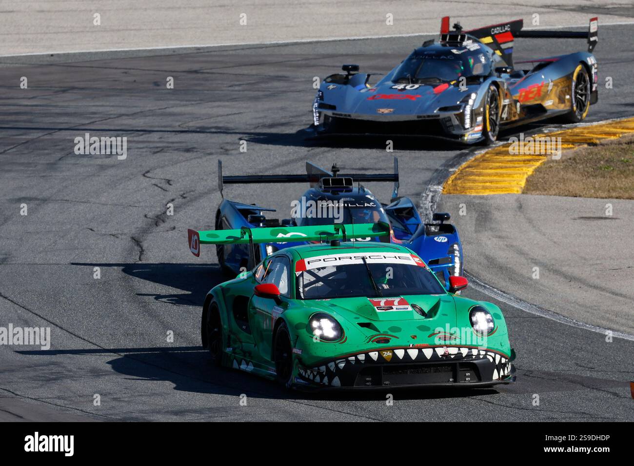 DAYTONA BEACH, FL - JANUARY 25: The #77 AO Racing Porsche 911 GT3 R ...