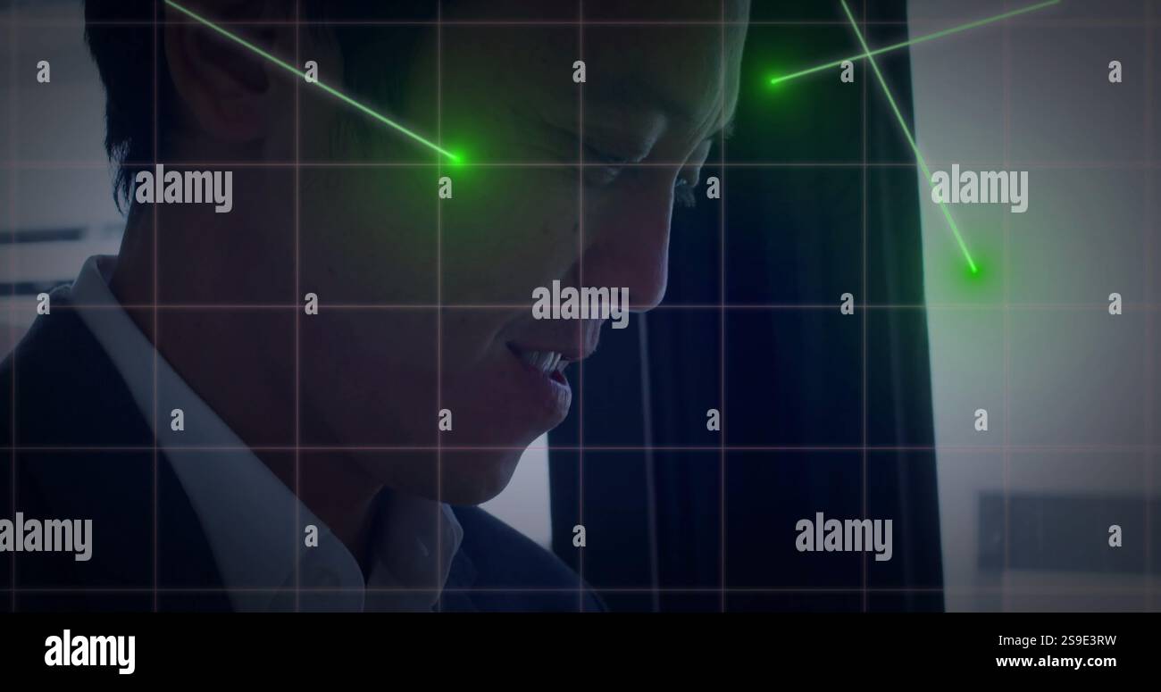 Green laser grid image over person in business attire Stock Photo