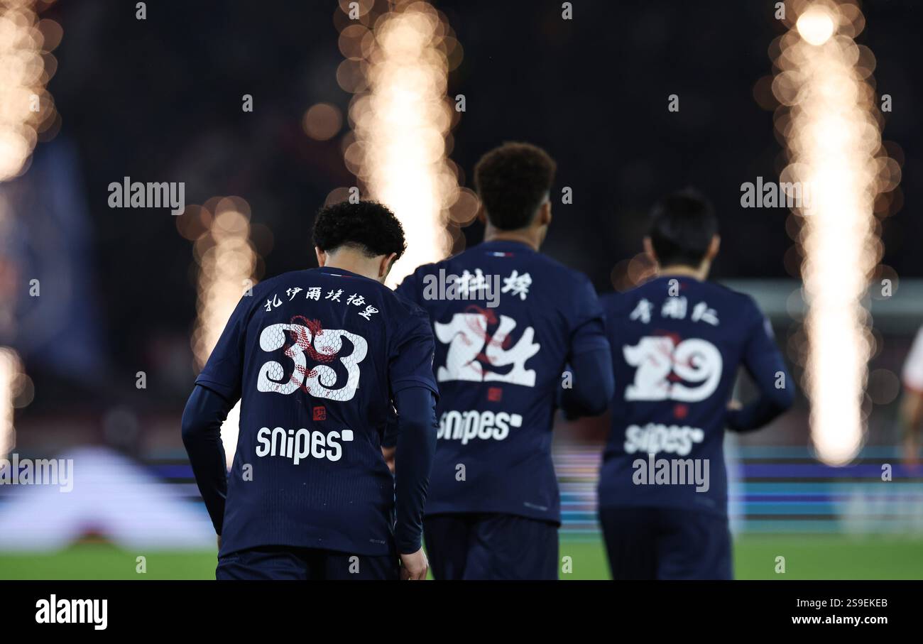 (250126) -- PARIS, Jan. 26, 2025 (Xinhua) -- Players of Paris Saint-Germain wear jerseys with their names in Chinese during a French Ligue 1 football match between Paris Saint-Germain and Stade de Reims as part of the Day of China activites to celebrate the Chinese Lunar New Year in Paris, France, Jan. 25, 2025. (Xinhua/Gao Jing) Credit: Xinhua/Alamy Live News Stock Photo