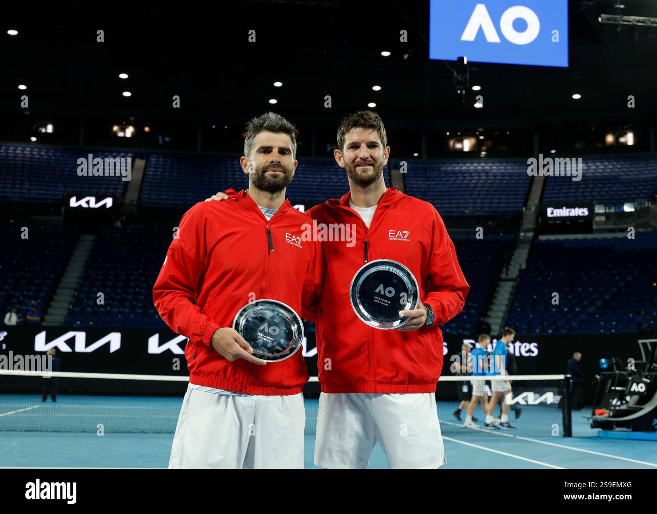 (250126) -- MELBOURNE, Jan. 26, 2025 (Xinhua) -- Simone Bolelli(L)/Andrea Vavassori pose for photos after the men's doubles final between Simone Bolelli/Andrea Vavassori of Italy and Harri Heliovaara of Finland/Henry Patten of Britain at Australian Open tennis tournament in Melbourne, Australia, Jan. 25, 2025. (Photo by Chu Chen/Xinhua) Credit: Xinhua/Alamy Live News Stock Photo