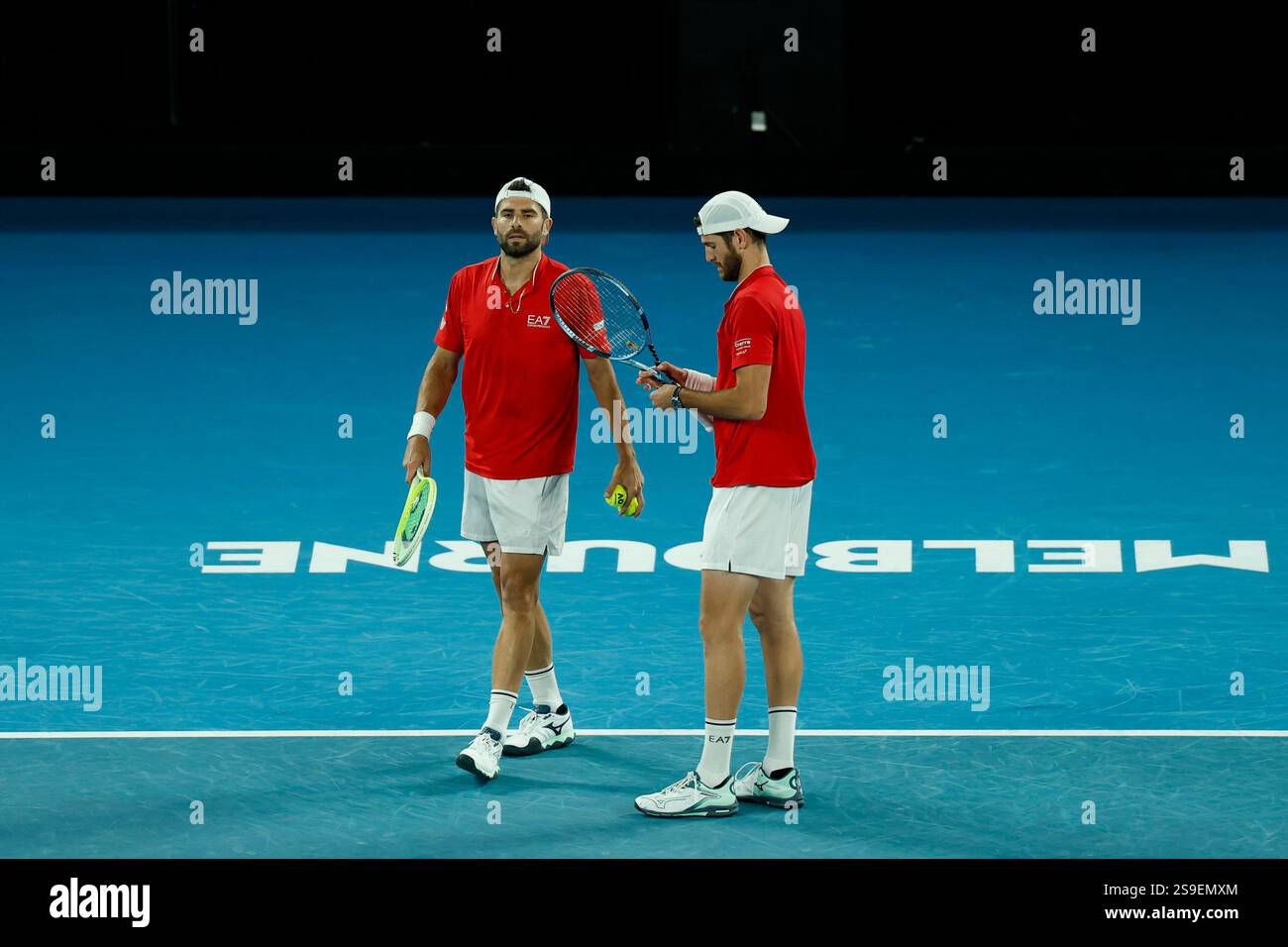 (250126) -- MELBOURNE, Jan. 26, 2025 (Xinhua) -- Simone Bolelli (L) /Andrea Vavassori react during the men's doubles final between Simone Bolelli/Andrea Vavassori of Italy and Harri Heliovaara of Finland/Henry Patten of Britain at Australian Open tennis tournament in Melbourne, Australia, Jan. 25, 2025. (Photo by Chu Chen/Xinhua) Credit: Xinhua/Alamy Live News Stock Photo