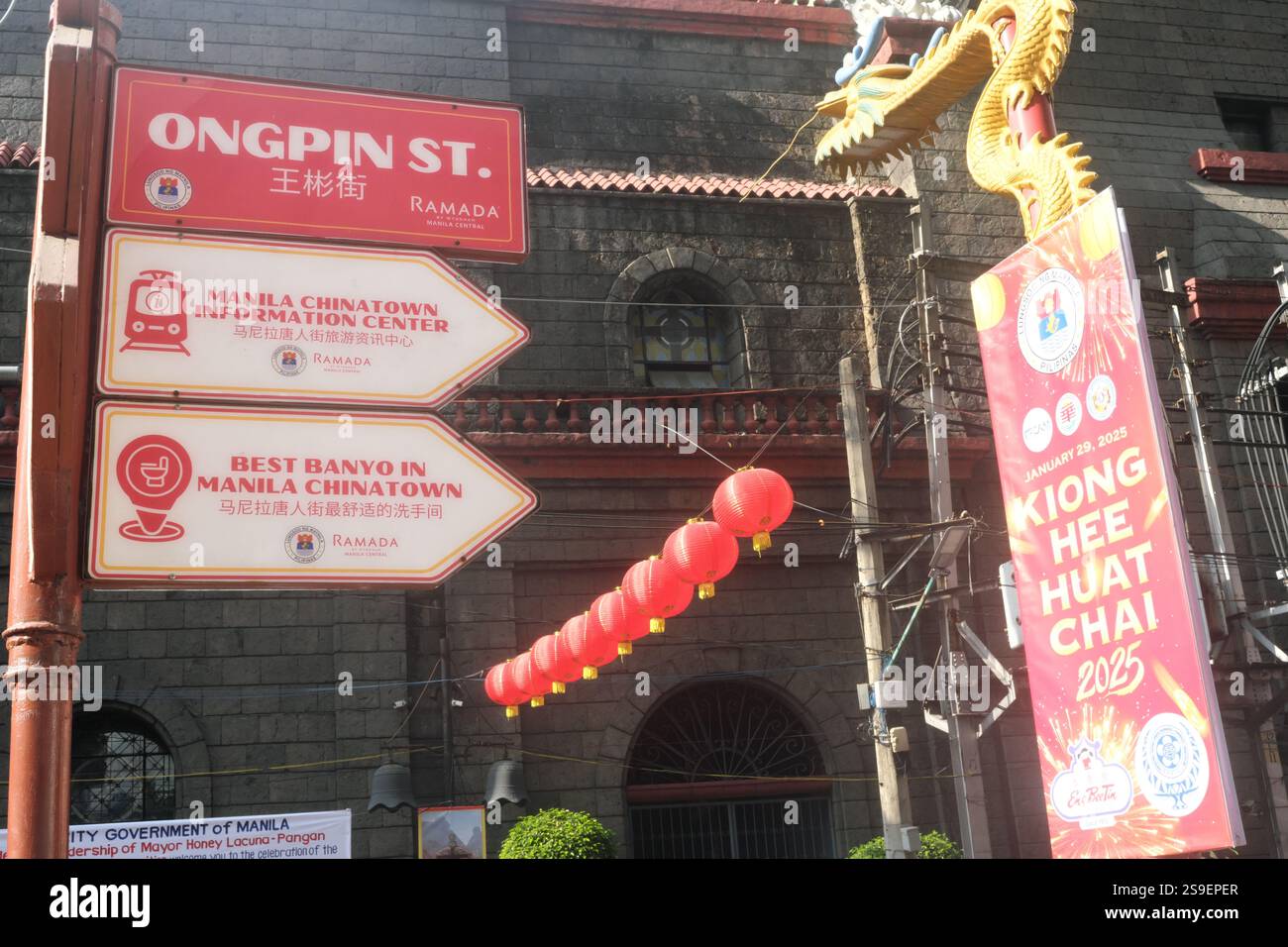 Manila, Philippines - January 25, 2025 : Ongpin street in the famous Binondo Chinatown days before the Chinese New Year. Stock Photo