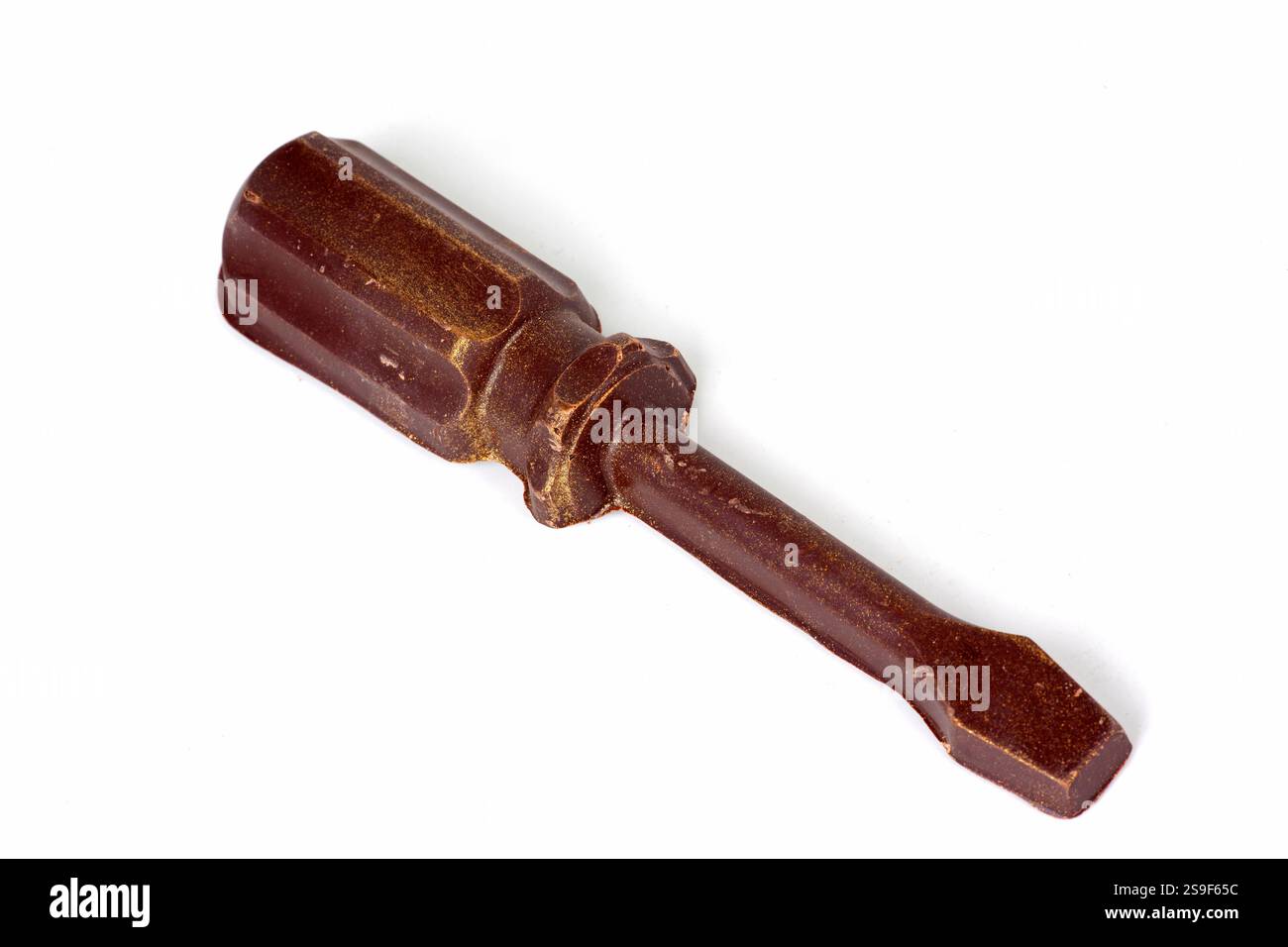 Old rusty screwdriver isolated on white background. Close-up. Stock Photo