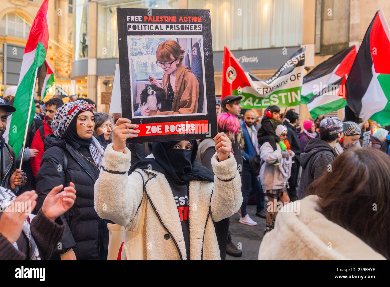 manchester-uk-25-jan-2025-demonstrators-hold-signs-for-jailed