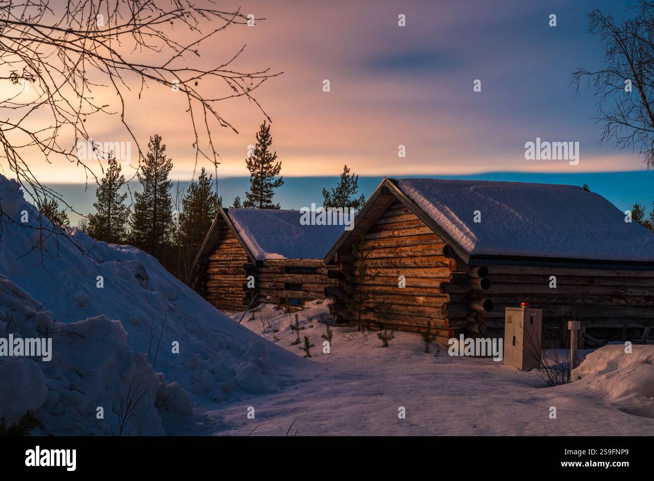 Beautiful sunset ln Akaslompolo in Finnish Lapland. Winter in Finland Stock Photo