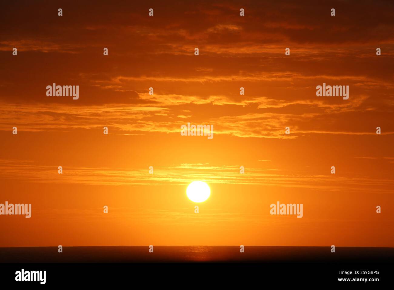 red sun set on La Reunion Stock Photo