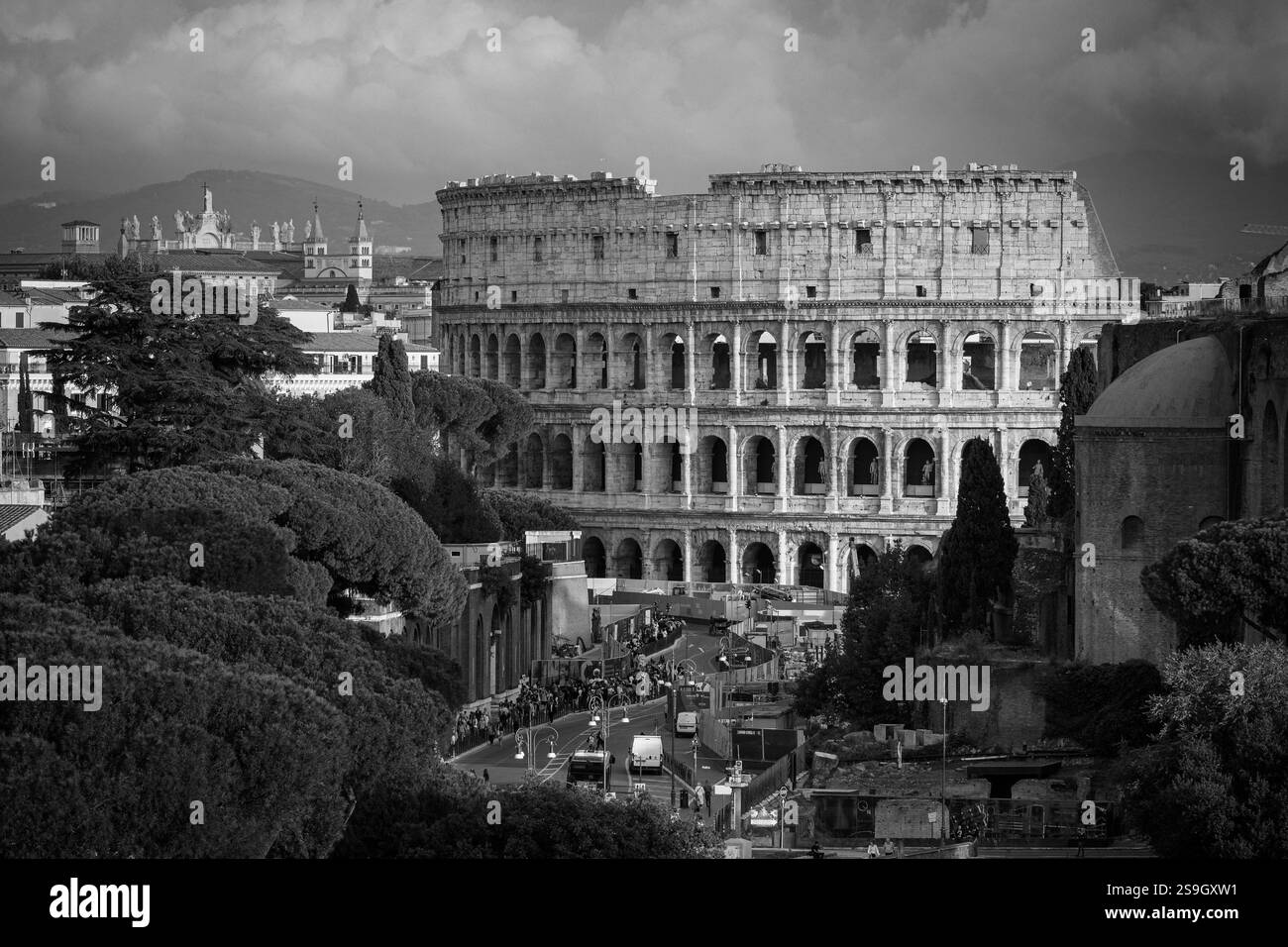 The iconic Colosseum standing tall amidst the trees and bustling ...