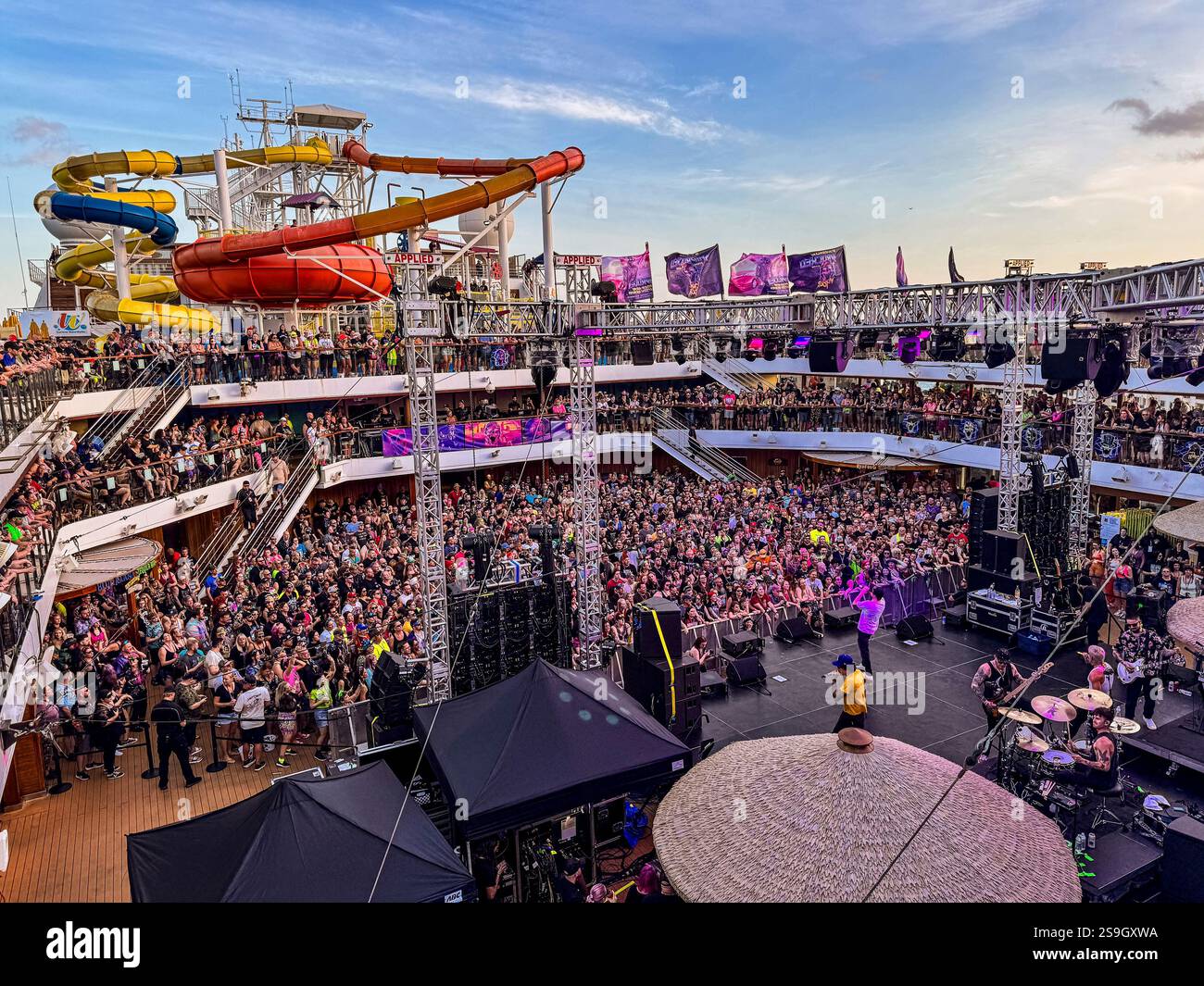 Festivalgoers are seen on board the Carnival Magic during day one of