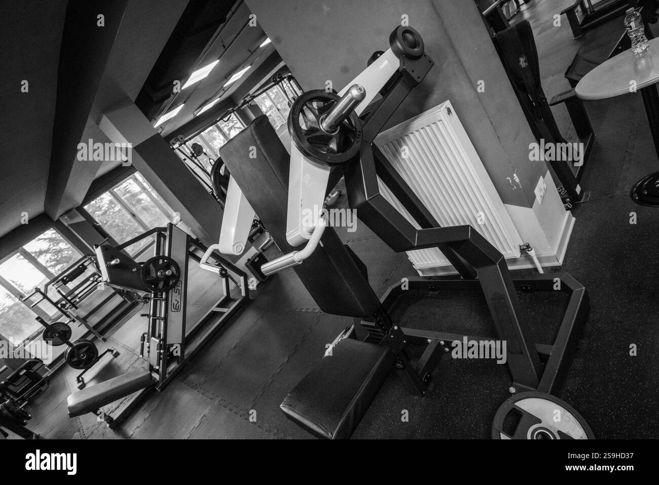 Barbell machines Black and White Stock Photos & Images - Alamy
