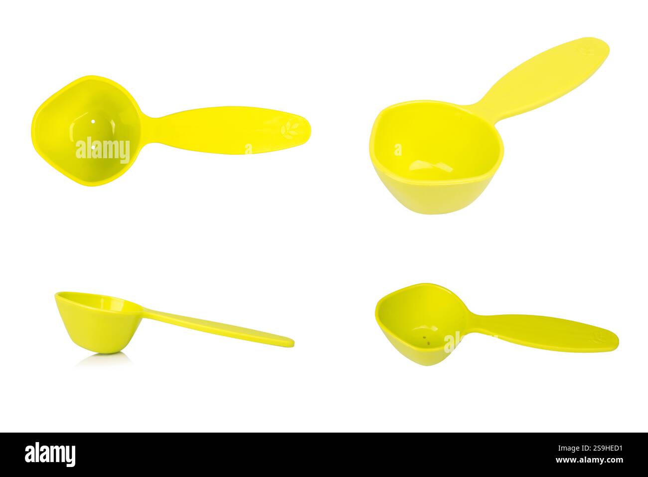 Green measuring spoon isolated on white background. Stock Photo