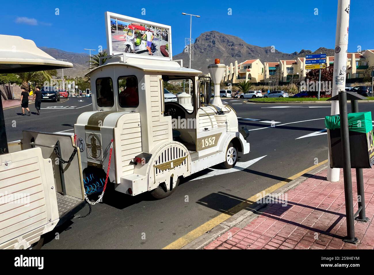 Land Train driving through Costa Adeje. Tenerife, Canary Islands, Spain. 14th January 2025. - Smartphone Captured Stock Image
