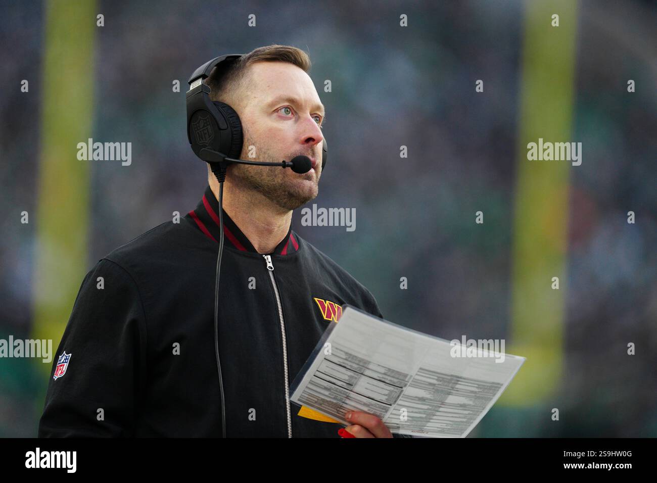 Washington Commanders offensive coordinator stands on the sideline ...