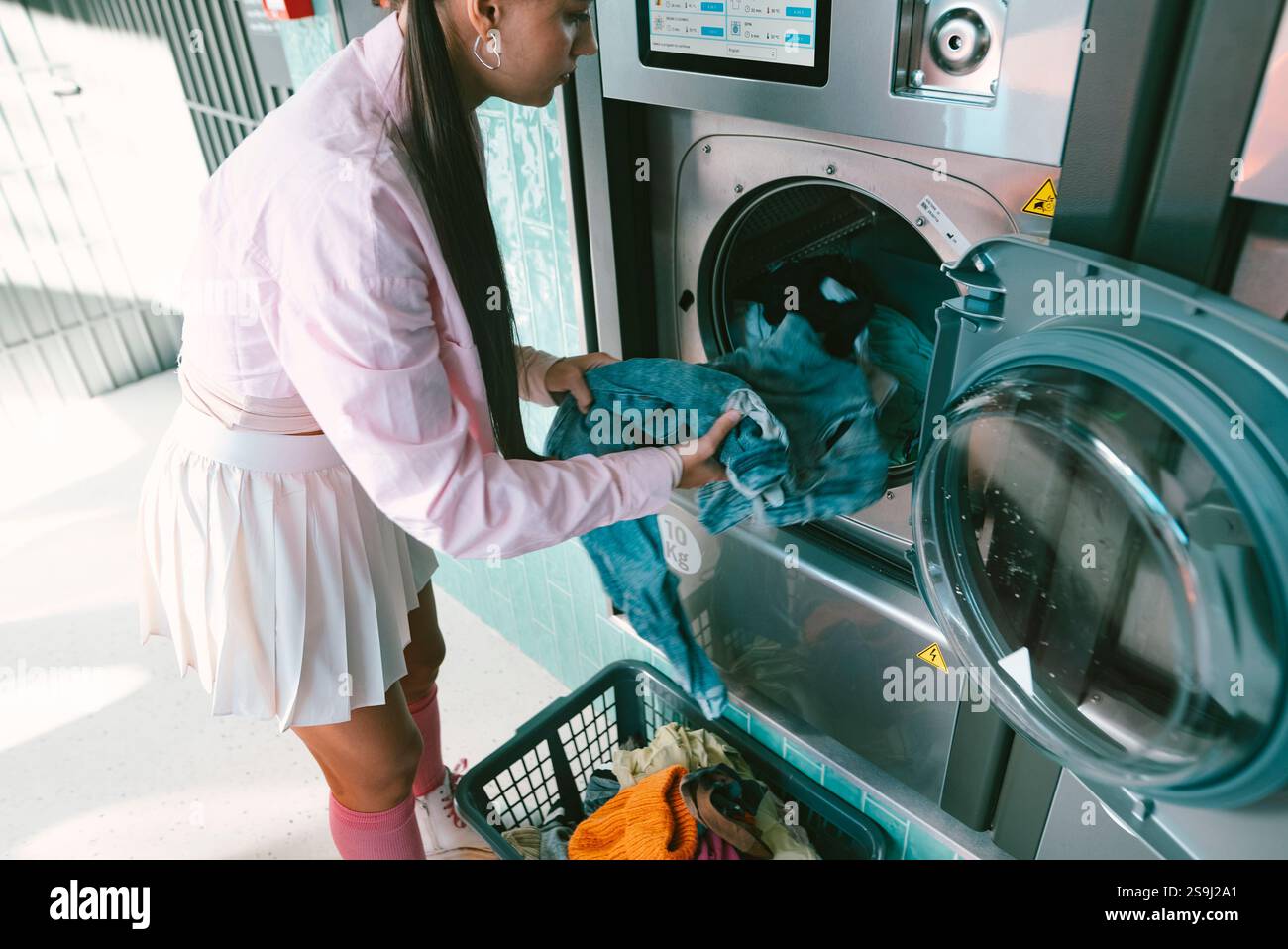 Washing clothes within a modern and wellequipped laundry facility is an ...