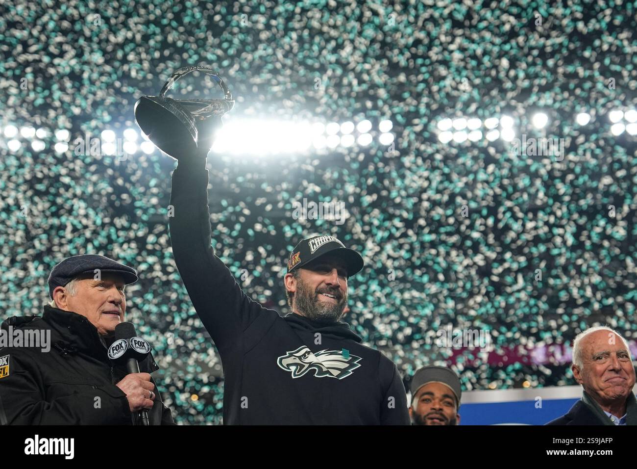 Philadelphia Eagles coach Nick Sirianni holds up the championship