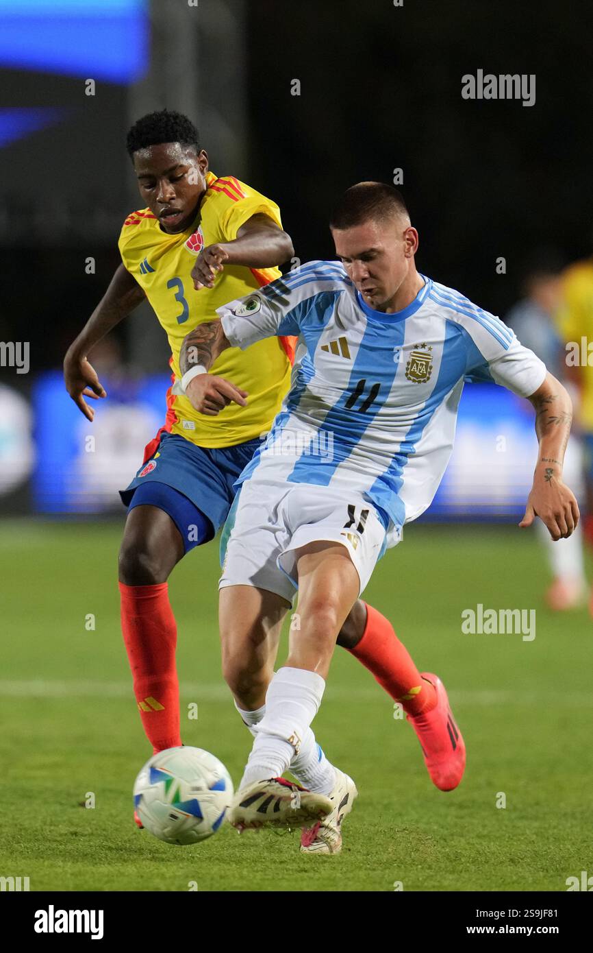Keimer Argentina's Franco Mastantuono passes the ball under pressure from ...