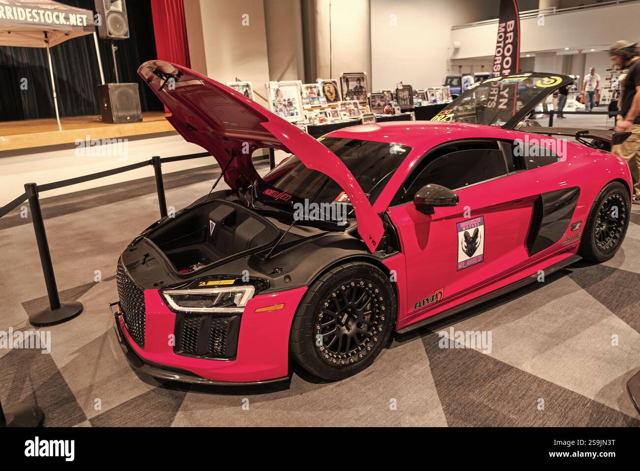 New York City, USA - March 27, 2024: Audi R8 sportscar pink car with ...