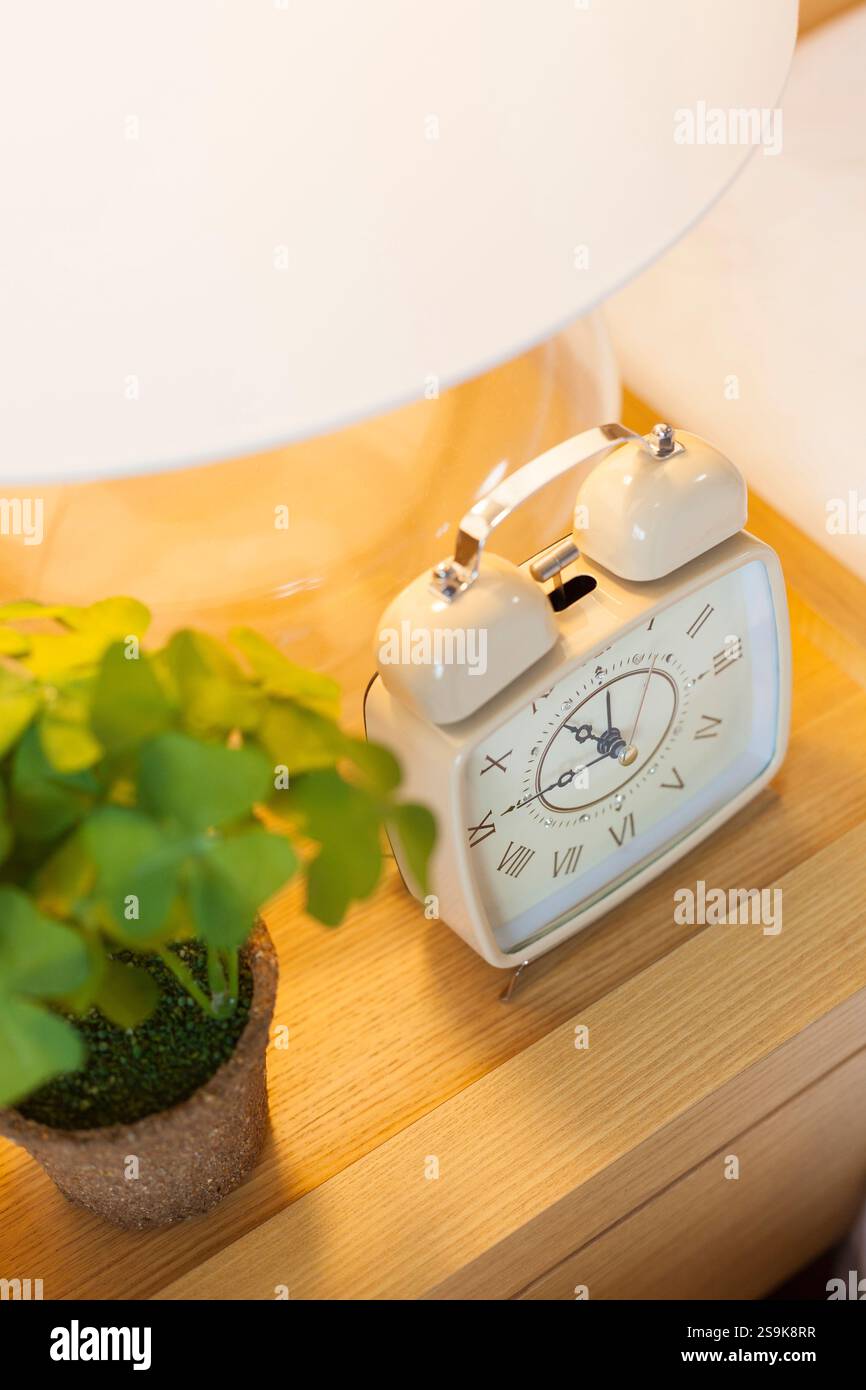 Interior with alarm clock Stock Photo - Alamy