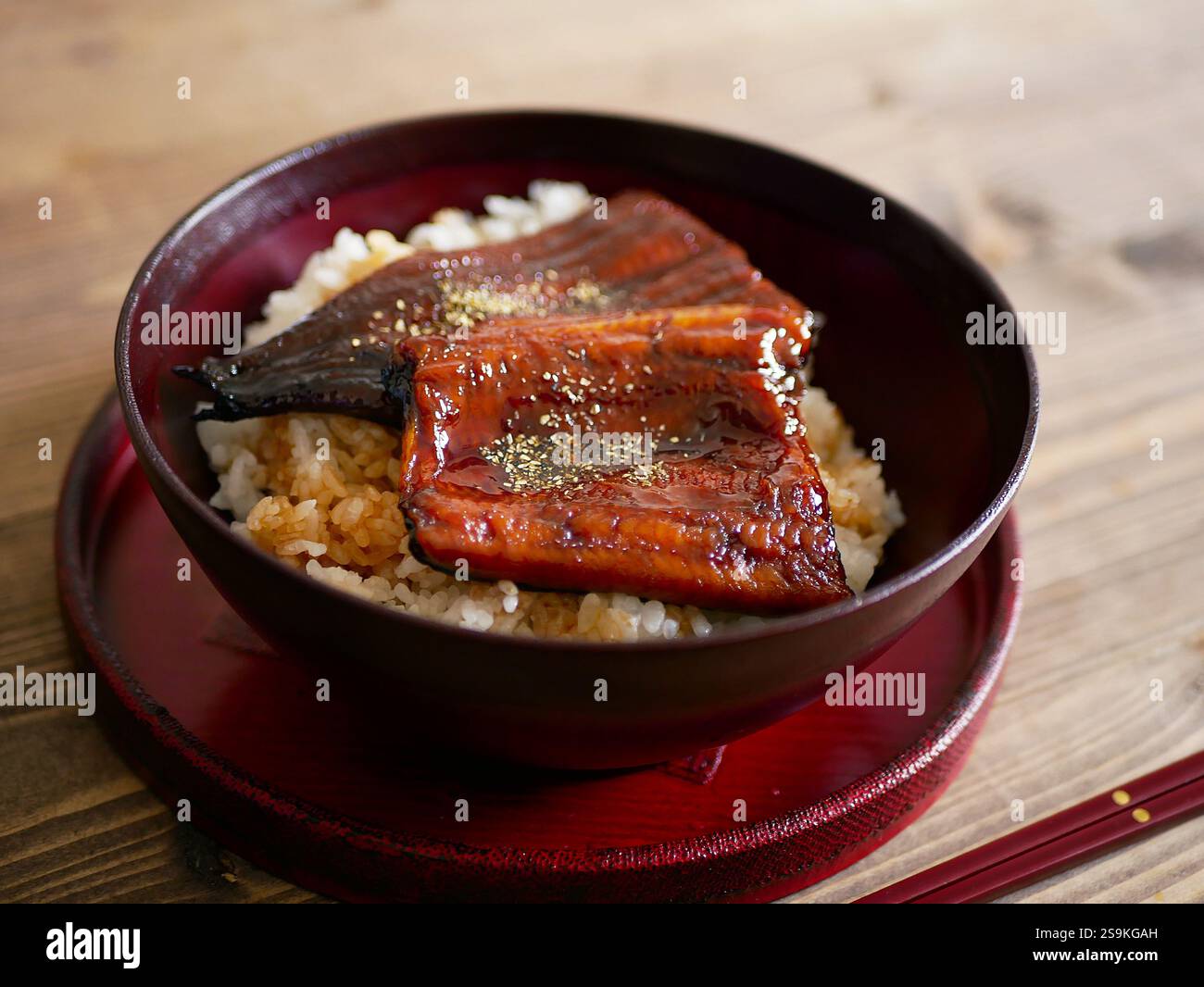 bowl of rice topped with eel and rice, Unadon Stock Photo - Alamy