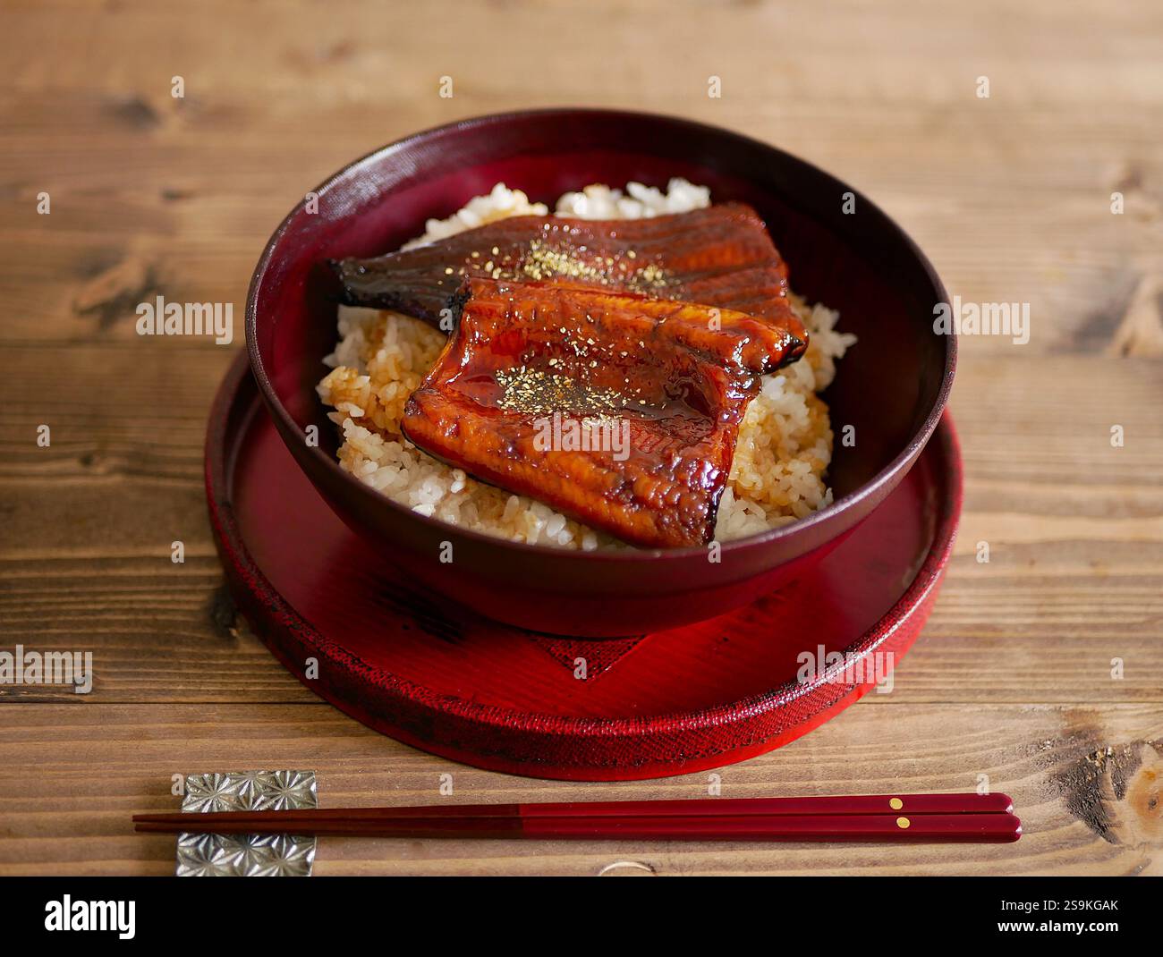 bowl of rice topped with eel and rice, Unadon Stock Photo - Alamy