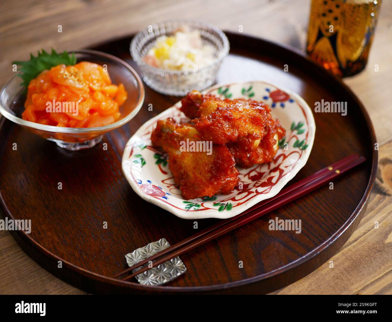 Seared chicken wing with squid cod roe Stock Photo - Alamy