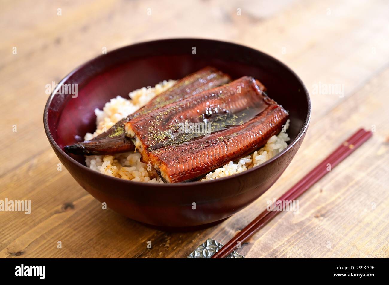 bowl of rice topped with eel and rice, Unadon Stock Photo - Alamy