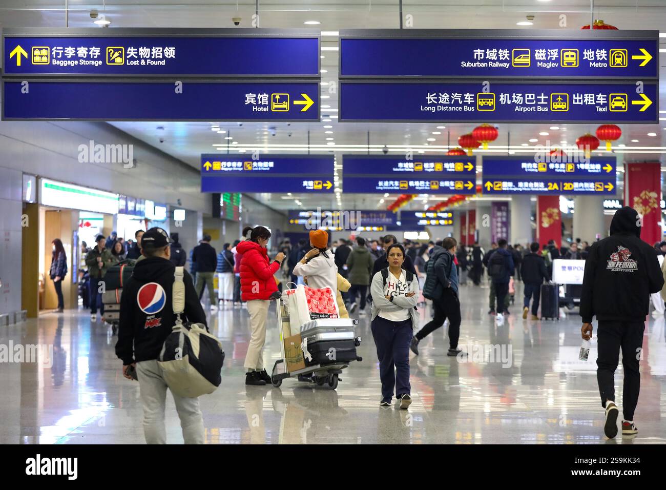 Passengers Are Seen At Shanghai Airport In Shanghai China 24 January passengers-are-seen-at-shanghai-airport-in-shanghai-china-24-january