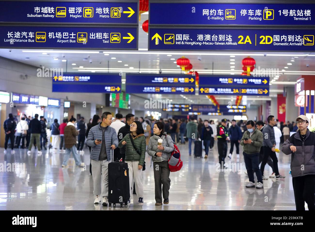Passengers Are Seen At Shanghai Airport In Shanghai China 24 January passengers-are-seen-at-shanghai-airport-in-shanghai-china-24-january