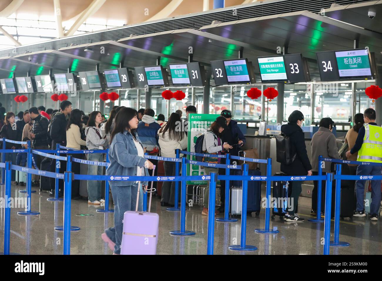 Passengers Are Seen At Shanghai Airport In Shanghai China 24 January passengers-are-seen-at-shanghai-airport-in-shanghai-china-24-january