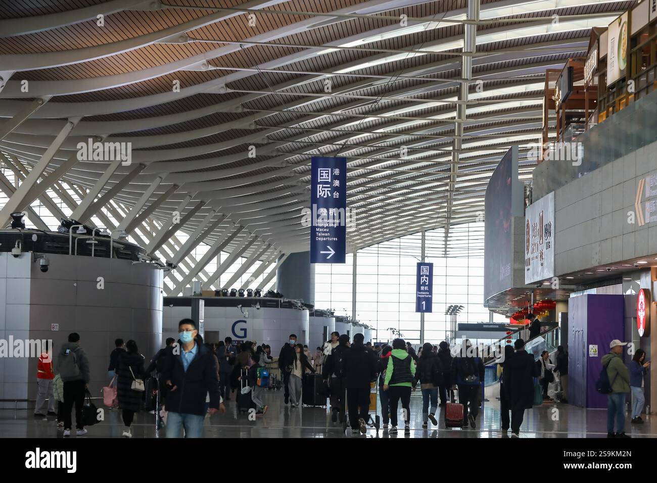 Passengers Are Seen At Shanghai Airport In Shanghai China 24 January passengers-are-seen-at-shanghai-airport-in-shanghai-china-24-january