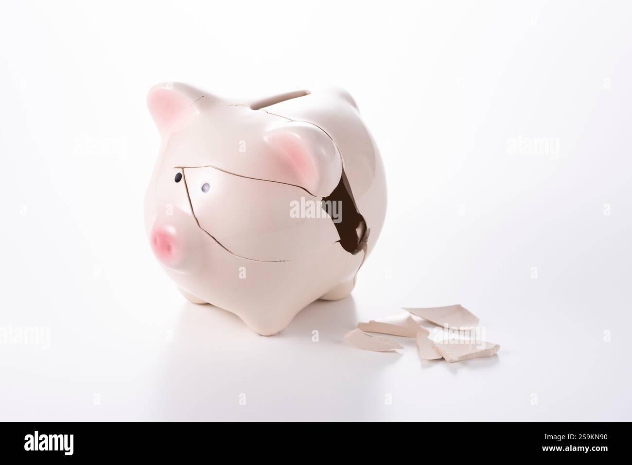 Broken piggy bank Stock Photo