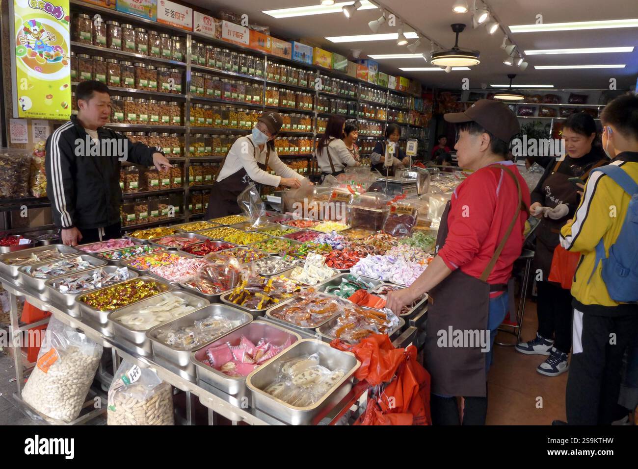 People select Spring Festival decorations in Guangzhou City, south
