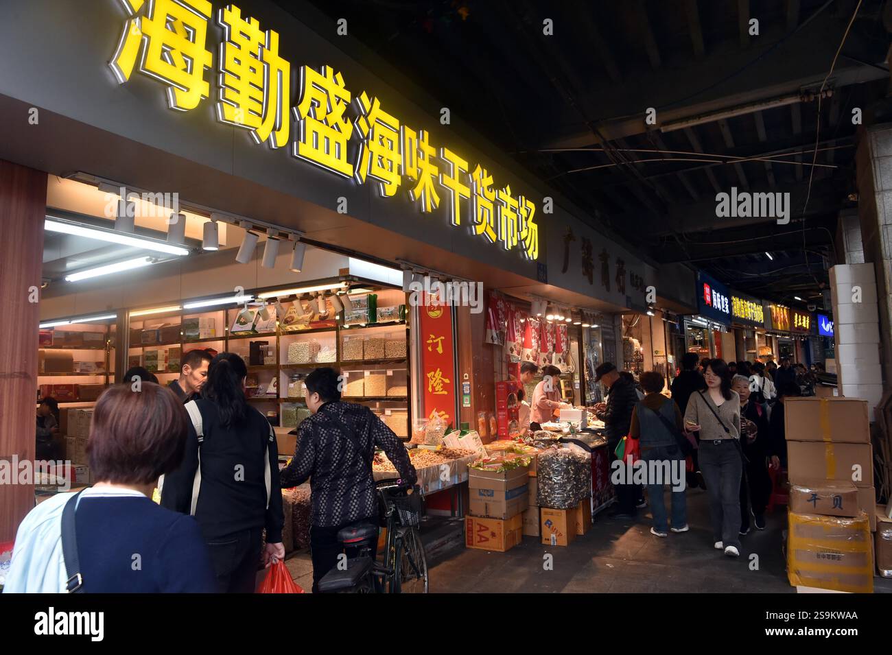 People select Spring Festival decorations in Guangzhou City, south