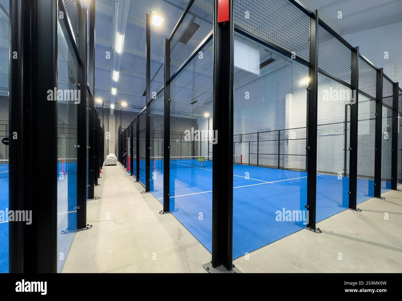Padel court with lines and net indoor Stock Photo - Alamy