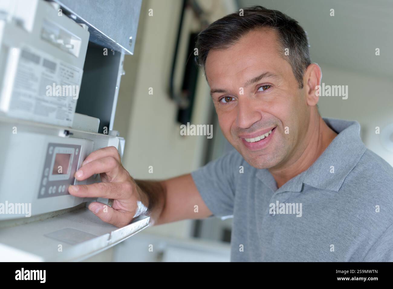 electrical engineer setting up panel Stock Photo - Alamy