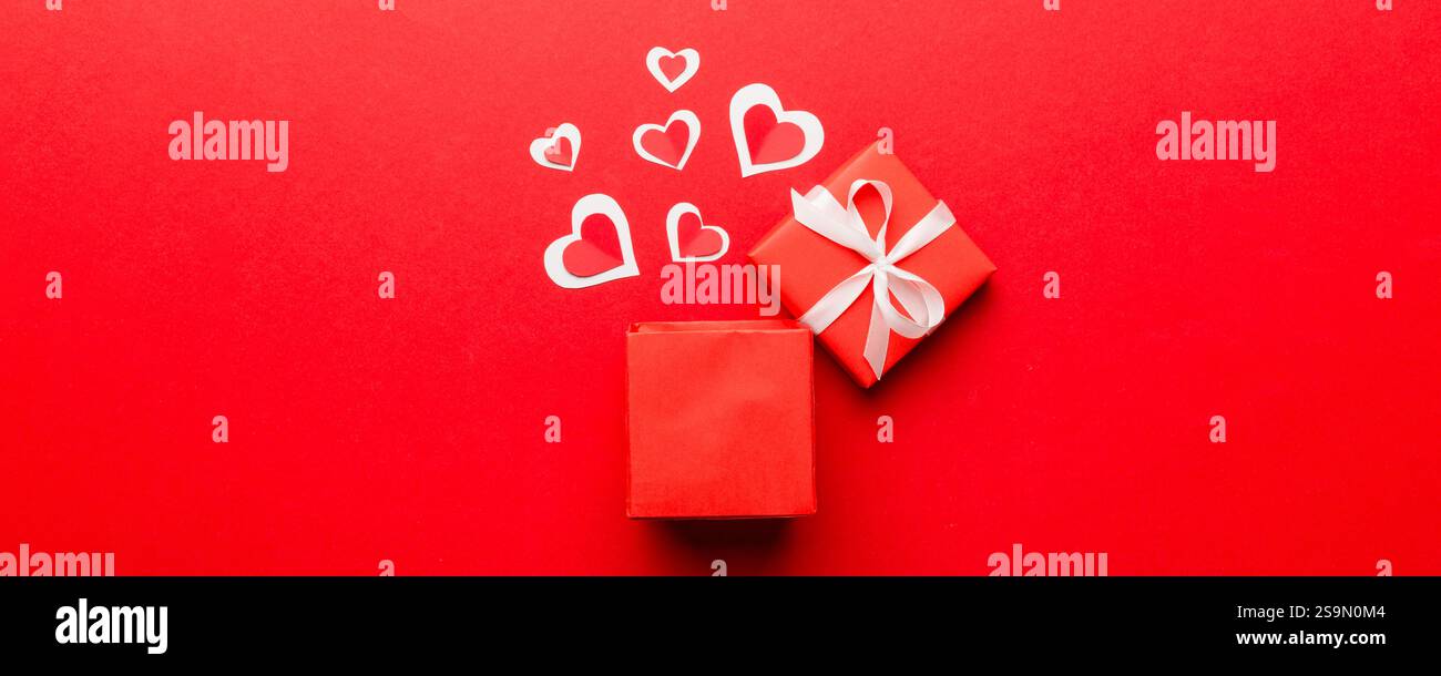 Happy valentines day opened heart shape gift box with small hearts, on ...