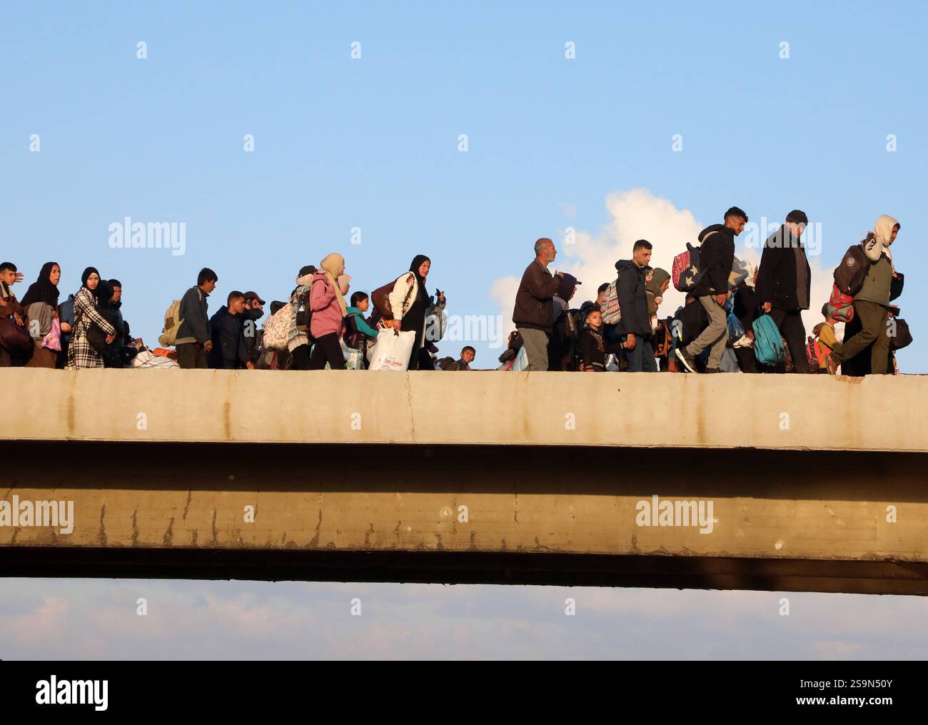 Palestinians, displaced by Israel forces, return their houses through ...