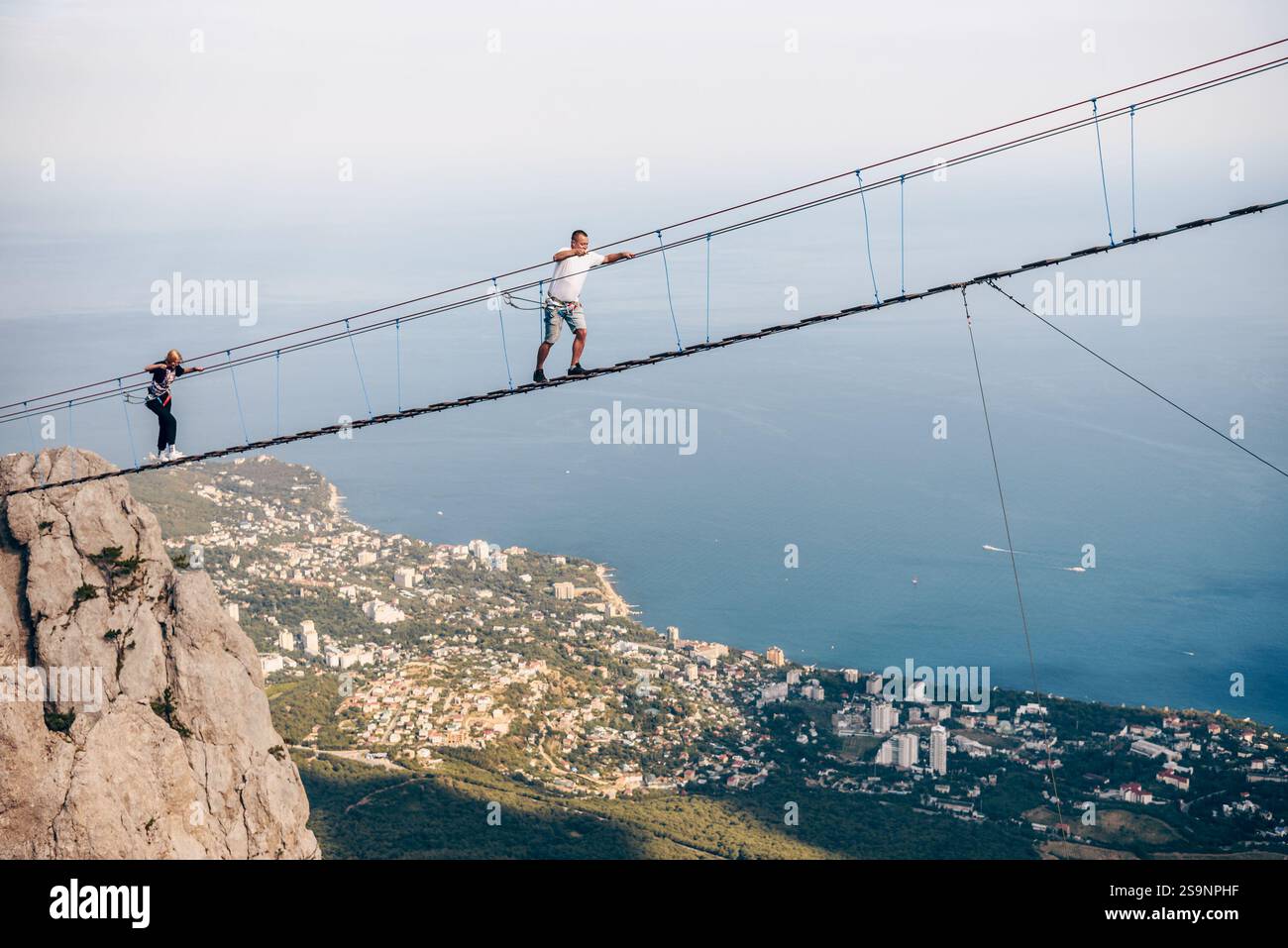 Ai-Petri, Crimea, 22 July 2020, Tourists climb in suspension bridge ...